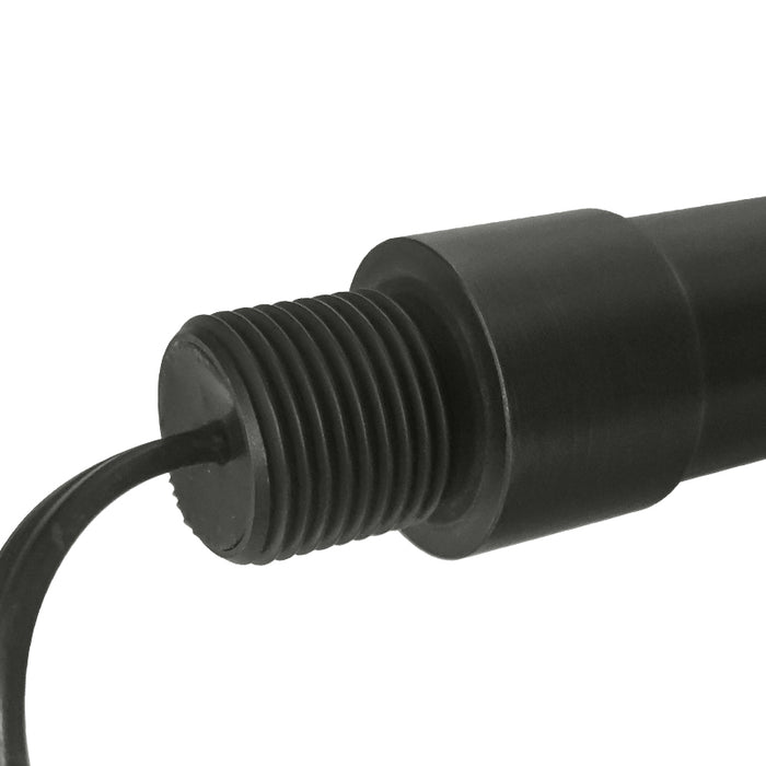 Brass path light set installed in outdoor landscape pathway